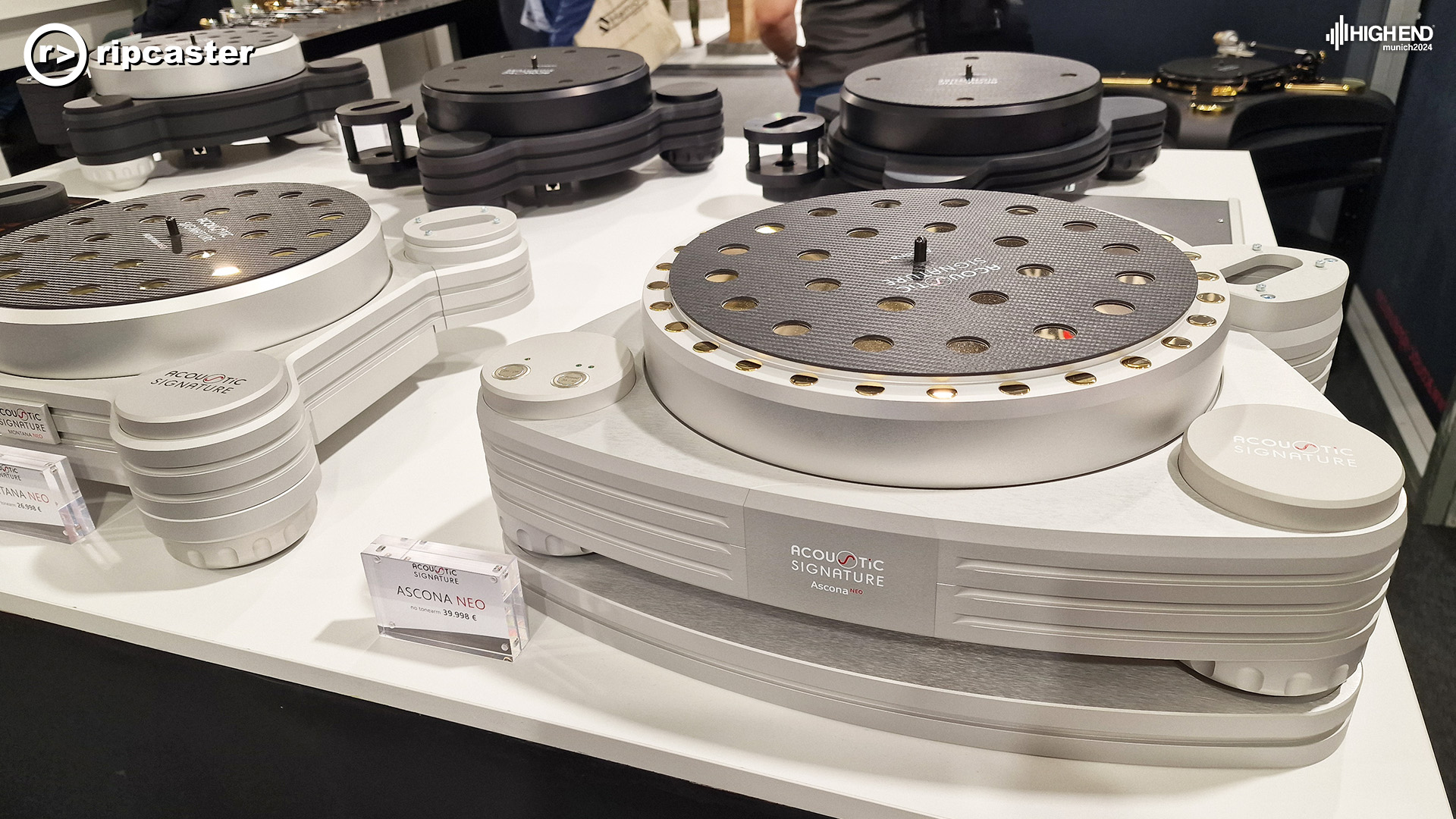Acoustic Signature turntables on a white unit