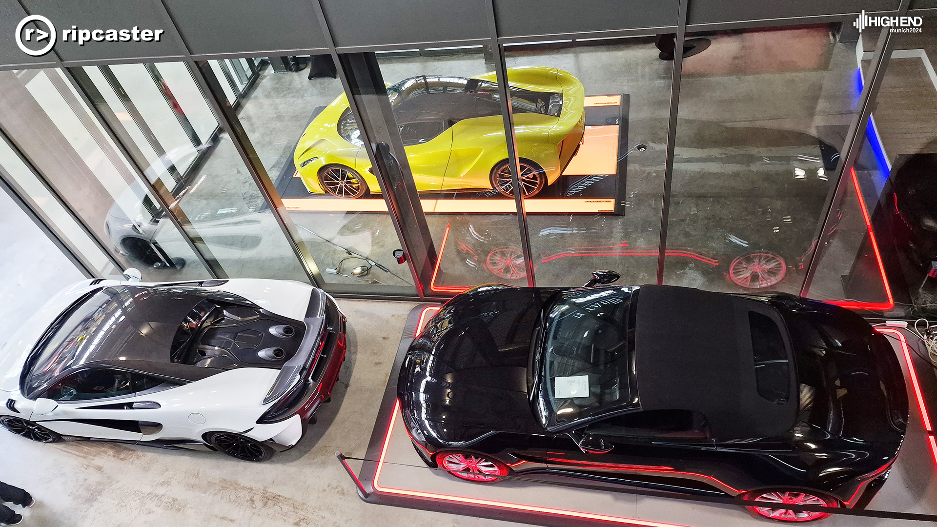 Three high end cars viewed from above