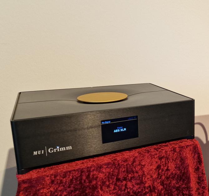 Grimm Audio MU1 streamer on a red velvet cloth.  Photo taken at the Munich HiFi show in 2024