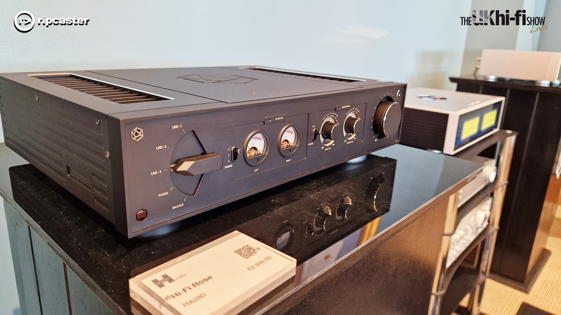 HiFi Rose RA280 in black on a HiFi unit.  There are other pieces of Rose equipment in the background