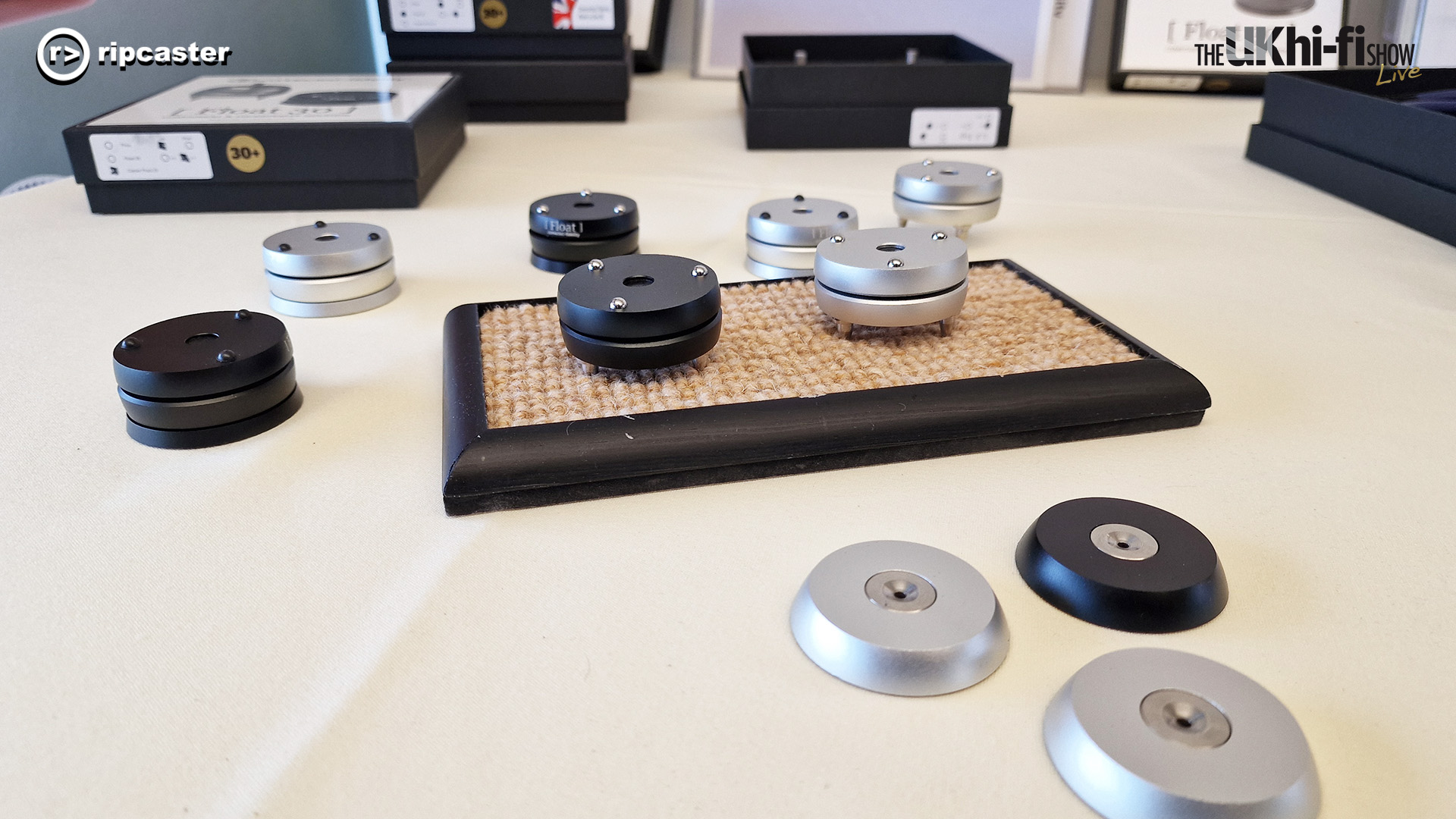 Ascot HiFi Show 2024.  Silver and black discs on the table