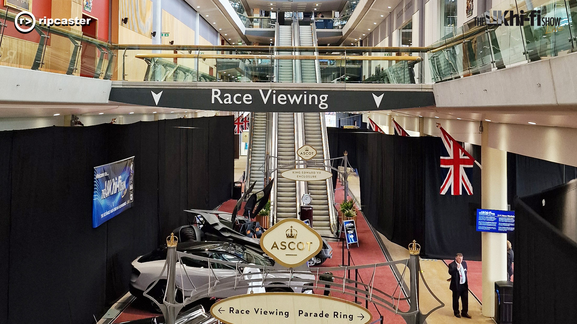 The Ascot interior viewed from a floor up showing the cars and a sign that reads "race viewing"