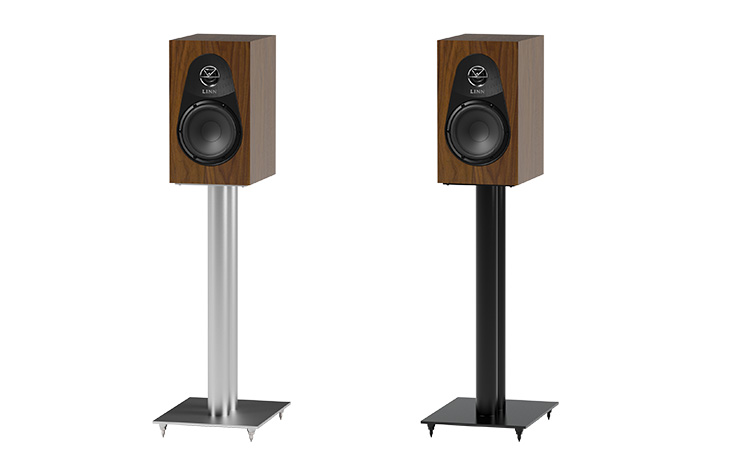 A pair of Linn 119 speakers.  The left one is on a silver stand and the one on the right is on a black stand