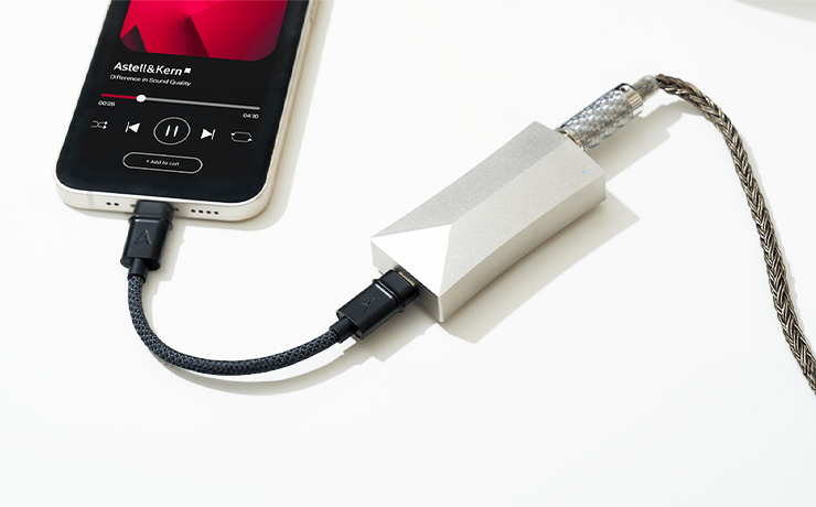 The Astell & Kern AK HC4 DAC and Amp connected to a mobile phone