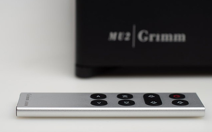 Grimm Audio IR Remote Handset with the packaging for the MU2 Grimm packaging in the background