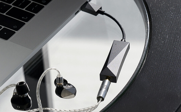 Astell & Kern HC3 plugged into a laptop and a pair of A&K earphones