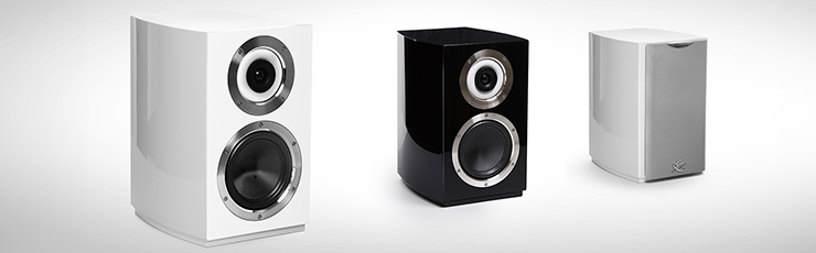 Three Cabasse Murano speakers.  One white, one black, one white with the grille on.