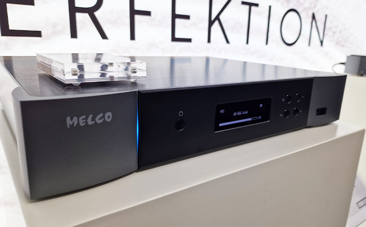 The Melco N5 - a black HiFi unit with a small screen, a power button and four buttons to the right of the display.