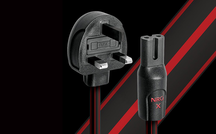 AudioQuest Power Cable with "NRG X" on the plug at one end and the other end a standard UK mains plug.  the cable is black with red stripes