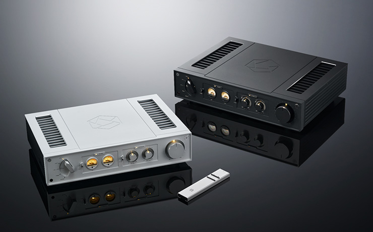 A pair of HiFi Rose RA280 integrated amplifiers one in silver and one in black.