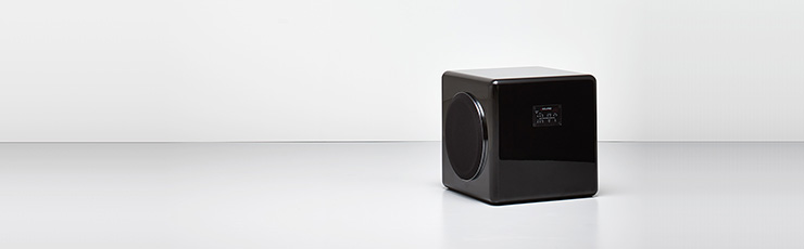The Eclipse TD520SW subwoofer on a grey background