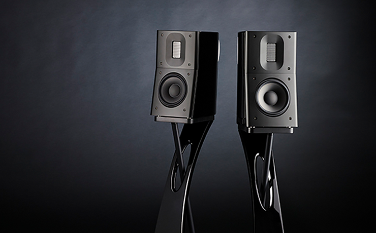 A pair of Raidho TD1.2 speakers on a black background