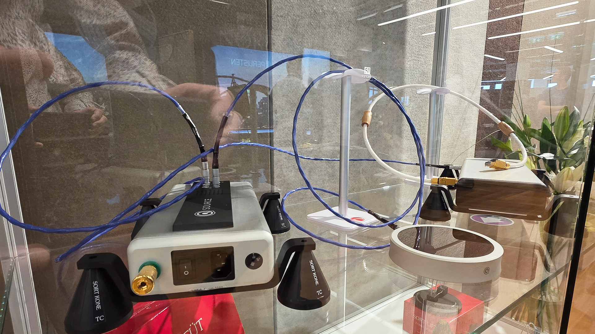 Nordost cables and units in a glass cabinet