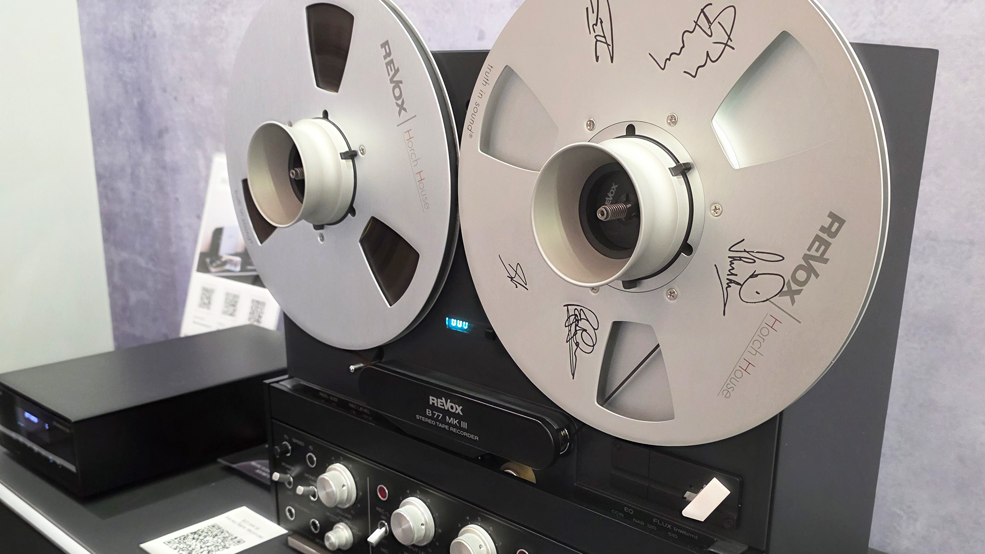 A Revox reel-to-reel player with signatures 
