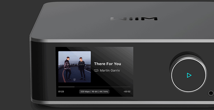WiiM Ultra Streamer showing the track art and the control knob