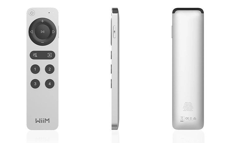 Three WiiM Voice Remote controls all viewed from a different angle.  First is viewed front-facing, second is a side-view and the third is a view of the back.  The remote control is a small, slim remote