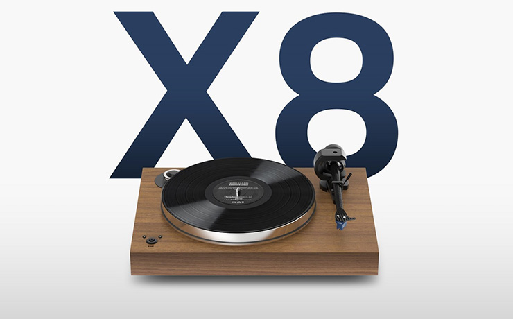 Project X8 Turntable with a large "X8" behind
