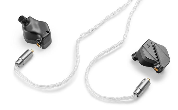 Astell & Kern Zero 2 earphones laying on a white surface.  The chord is disconnected from the earbuds