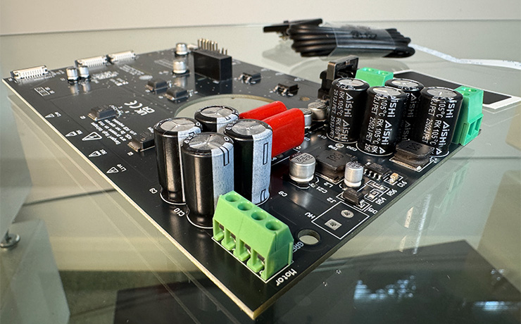 A circuit board on a glass shelf