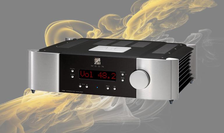 MOON 700i v2 Integrated Amplifier on a background of yellow and white smoke
