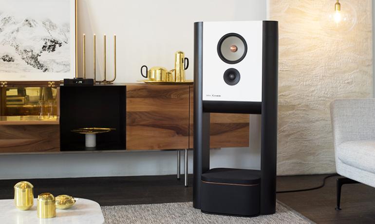 Grimm Audio Speaker in a living area with a side-board and a low table in the foreground
