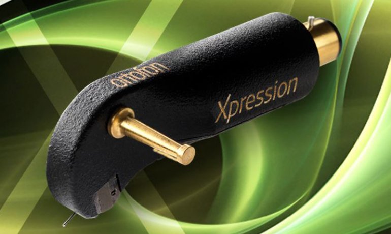Ortofon Xpression Cartridge on a green background