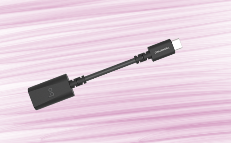 AudioQuest DragonTail USB A to C Adaptor on a pink background