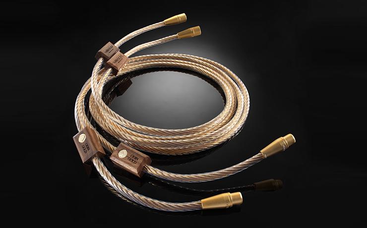 Nordost Odin Gold Analogue Interconnect Cable on a black background