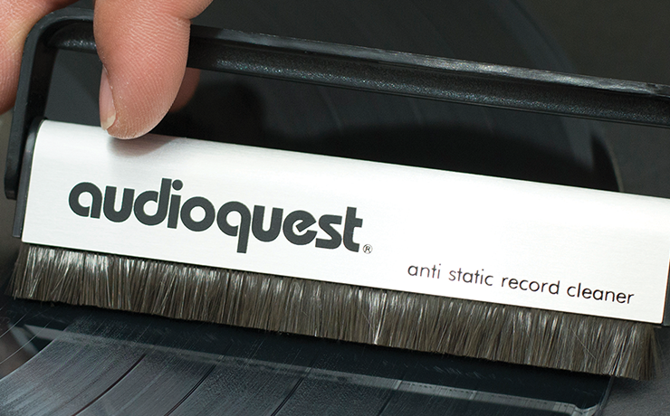 AudioQuest Anti-Static Record Brush being held and cleaning a record