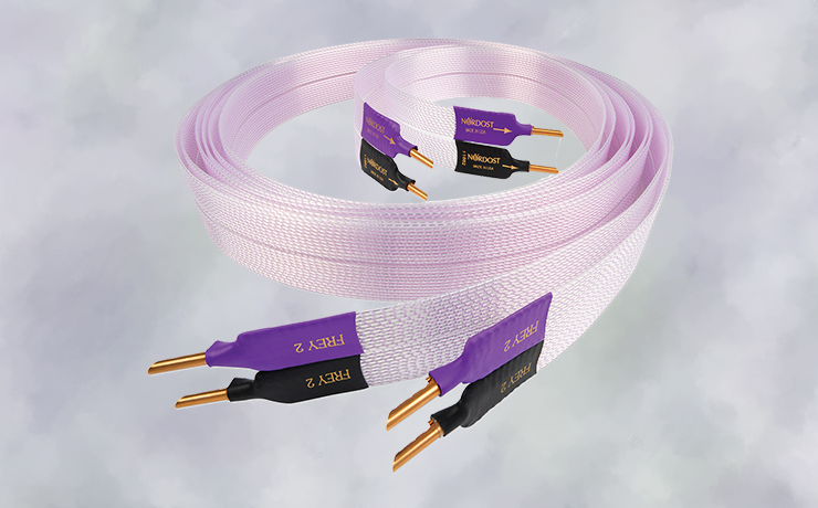 Nordost Frey 2 Speaker Cable.  Background is splodgy muted puple with a little green.
