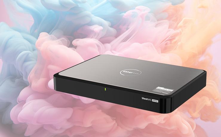 QNAP HS-264 NAS Storage on a background of pastel coloured smoke