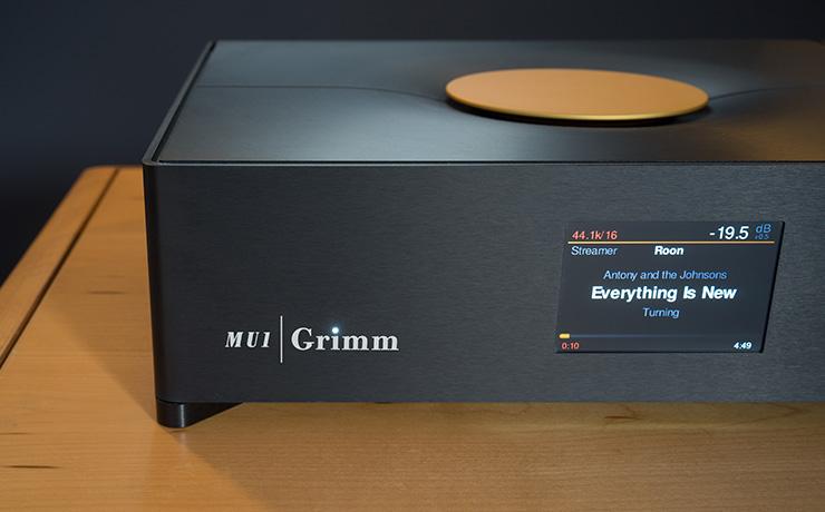the Grimm MU1 on a wooden table.