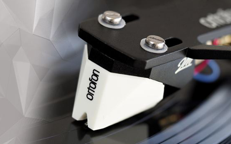 Ortofon 2M Mono Cartridge on a tonearm playing a record.