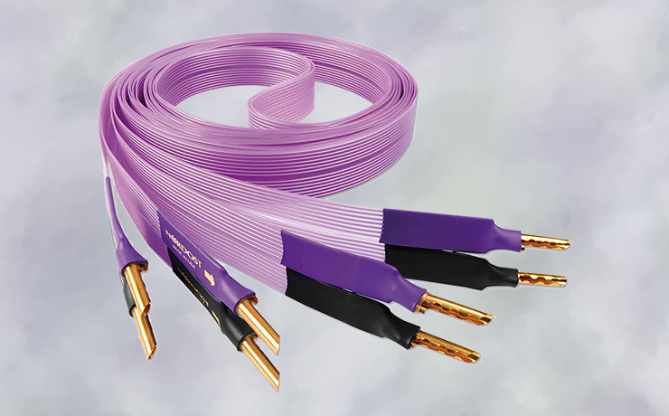 Nordost Purple Flare Speaker Cable on background of purple and green muted colours
