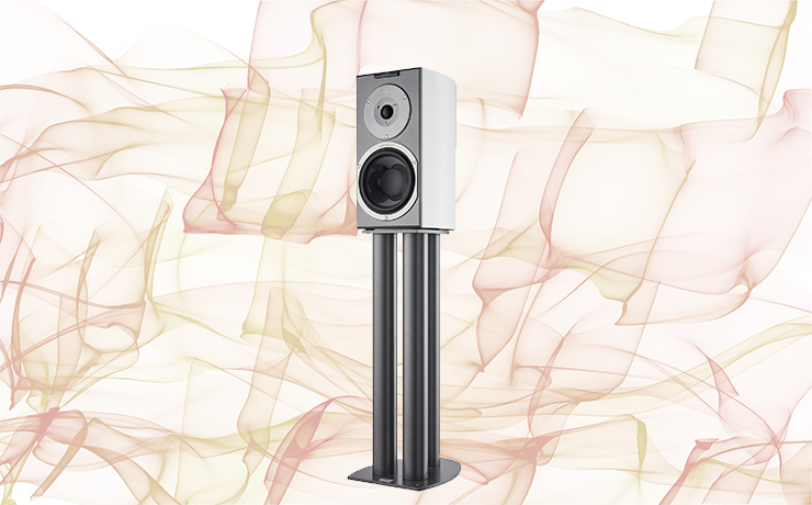 Audiovector R1 Signature Loudspeaker.  Background is shades of amber ribbon like wavy lines.