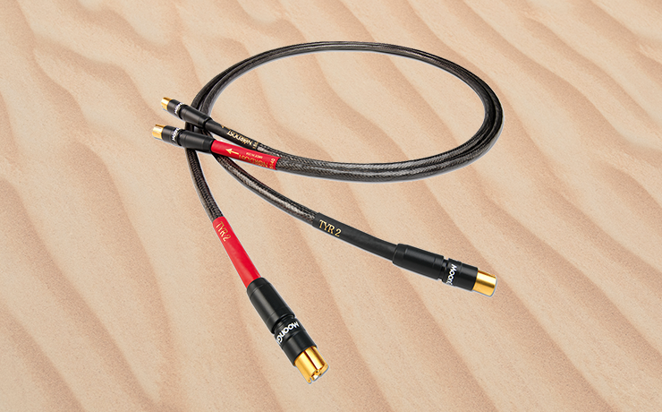 Nordost Tyr 2 Analogue Interconnect Cable.  Background is rippled sand - pexels-aleksandar-pasaric-1527934