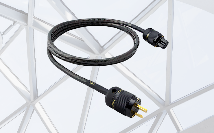 Nordost Tyr 2 Power Cable.  Background: pexels-adrien-olichon-3137080 which is a criss-cross metal roof with glass.