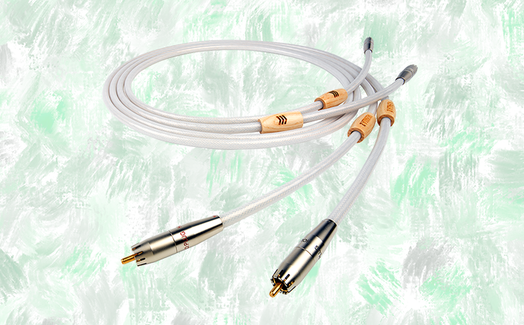 Nordost Valhalla 2 Analogue Interconnect Cable.  Background is painted splodges of green and grey.