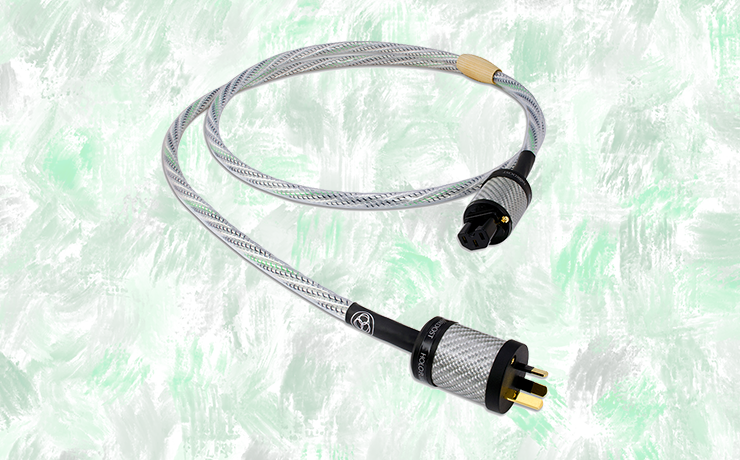 Nordost Valhalla 2 Power Cable.  Background is painted splodges of green and grey.