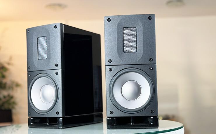 A pair of black Raidho X1t speakers in the ripcaster showroom