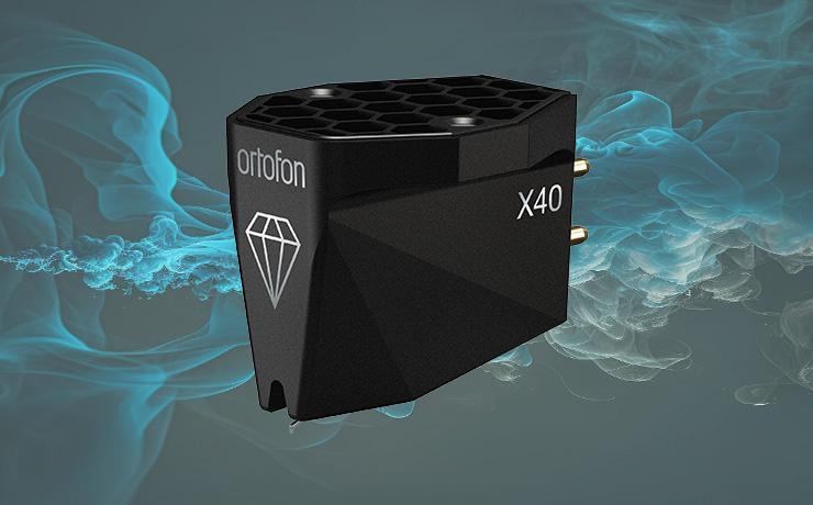 The Ortofon MC X40 Cartridge on a smoky blue background