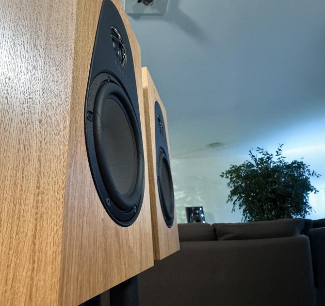 A pair of oak Linn 119 Loudspeakers in the ripcaster showroom
