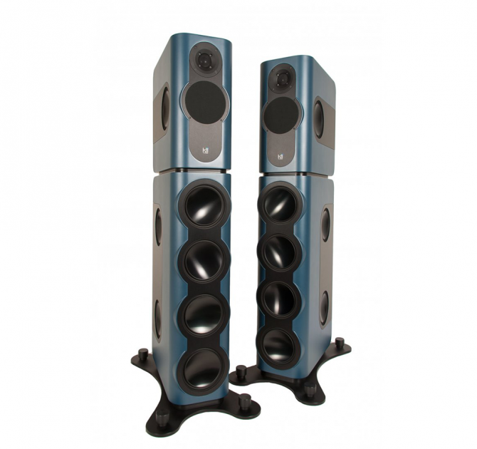 A pair of Kii Three BXT Loudspeakers in a teal colour