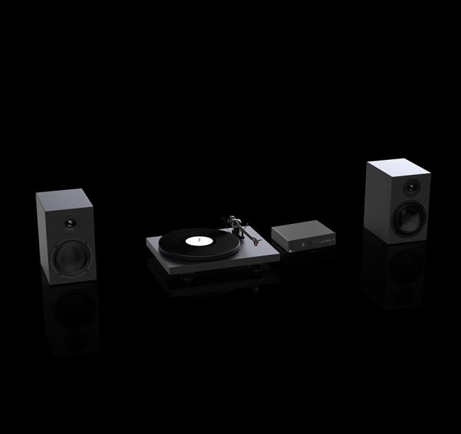 Two speakers and a turntable in black with a Project Maia S3