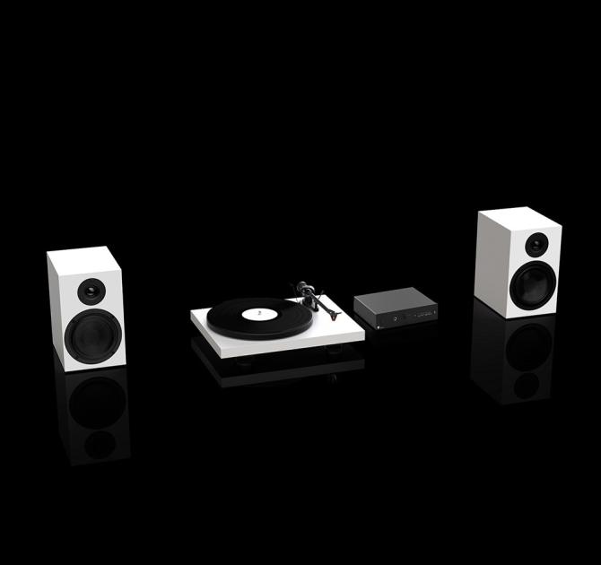 Two speakers and a turntable in white with a Project Maia S3