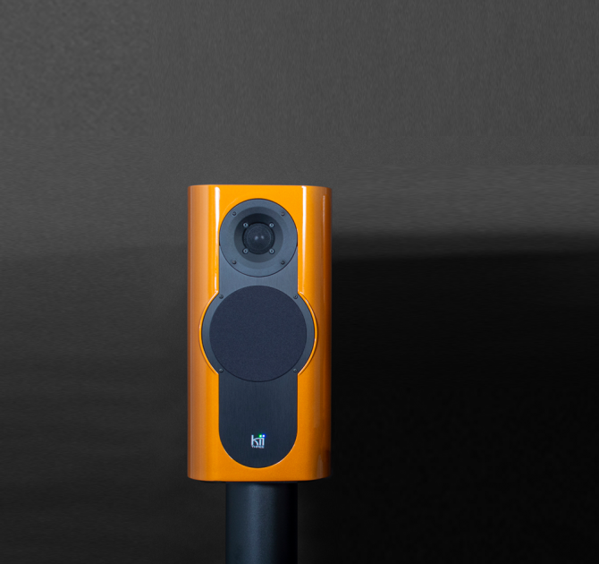 A single Kii Three Loudspeaker in Orange