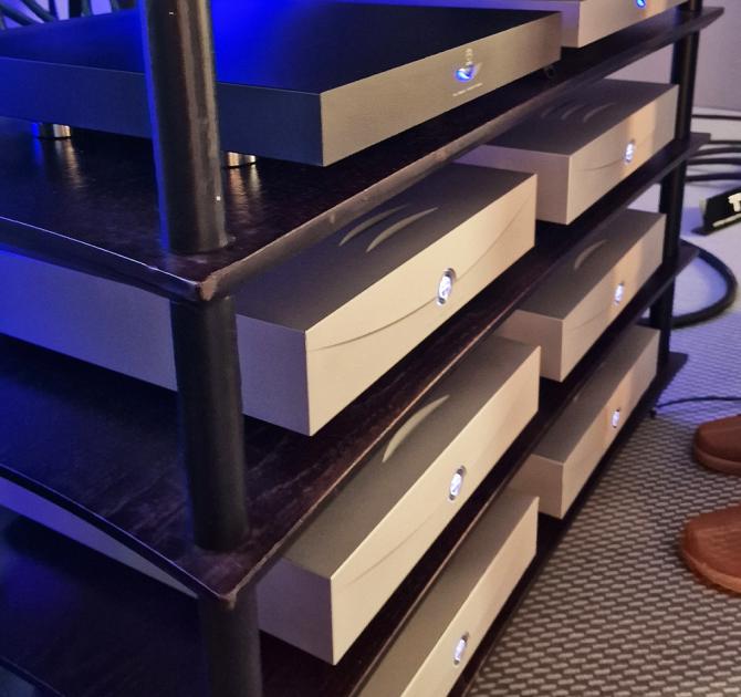 a rack of silver Klimax Solo 500 amplifiers