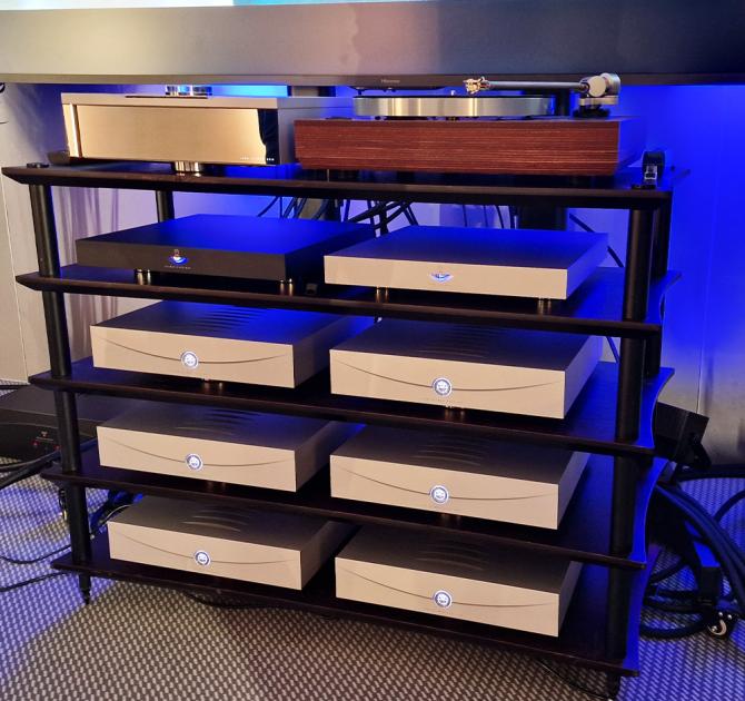 a rack of silver Klimax Solo 500 amplifiers