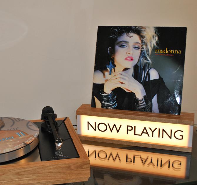 Now Playing wooden lightbox with a Madonna album in the groove at the top.  Beside an LP12