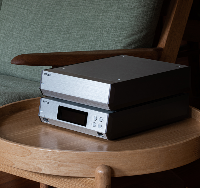 Melco N10/2 Digital Music Library in silver, one on top of the other on a table.